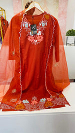 Appliqué work cotton suit paired with organza dupatta