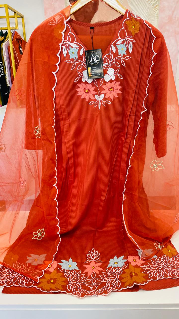 Appliqué work cotton suit paired with organza dupatta