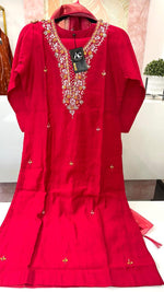 Muslin suit set paired with orgenza dupatta