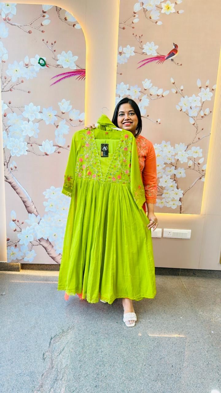 Pretty Mul cotton with intricate embroidered detailing paired with a brush painted dupatta in green