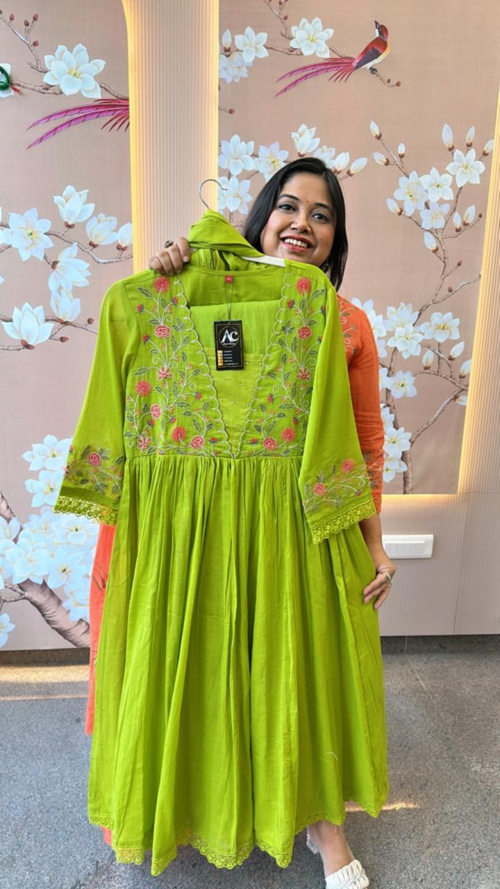 Pretty Mul cotton with intricate embroidered detailing paired with a brush painted dupatta in green