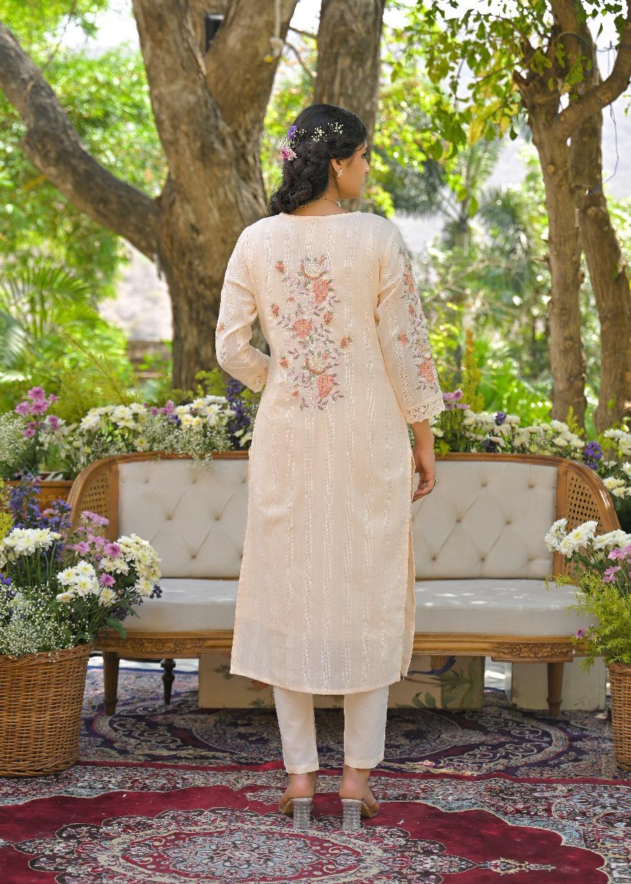 Gorgeous almond colour embroidered suit set