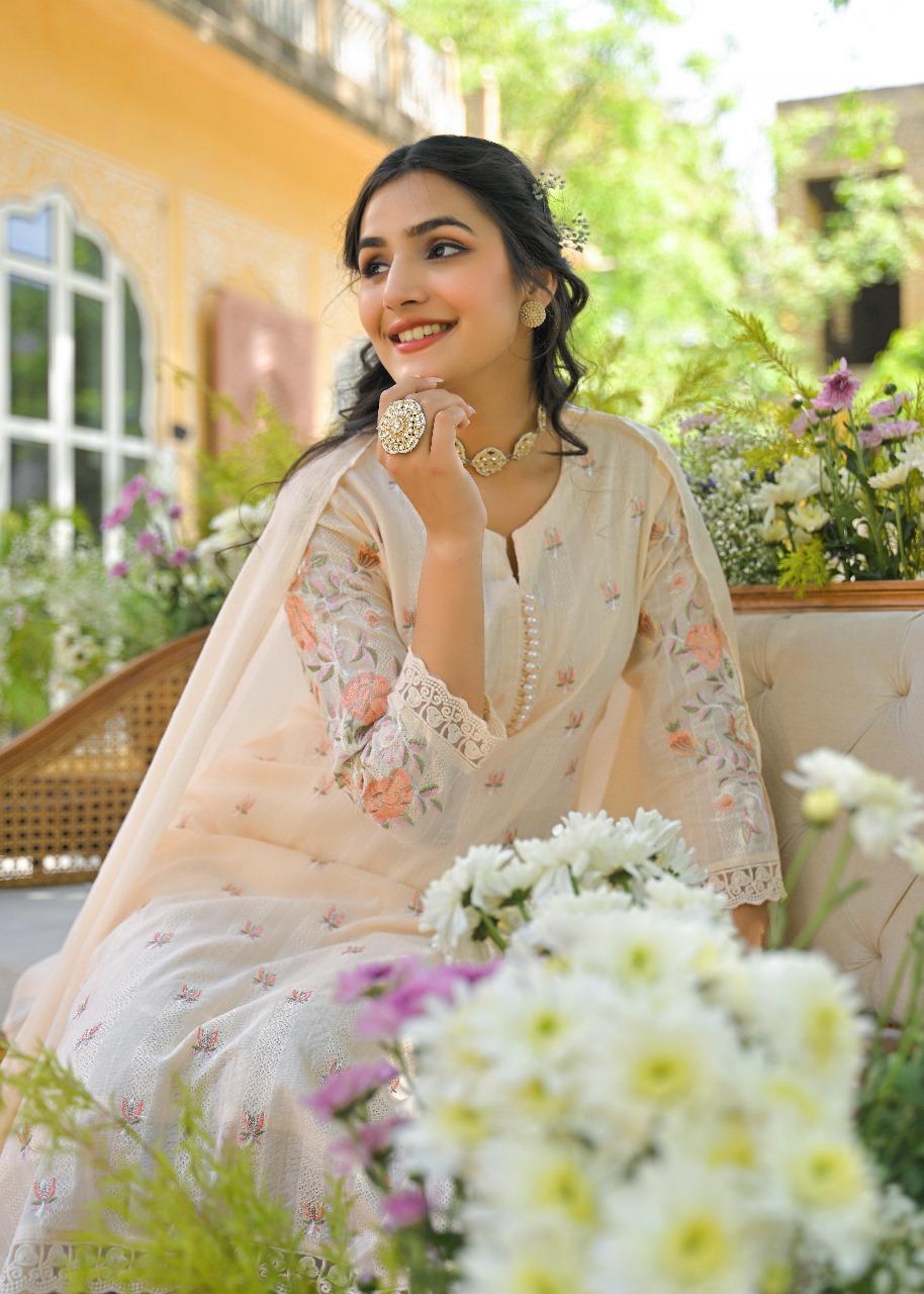 Gorgeous almond colour embroidered suit set