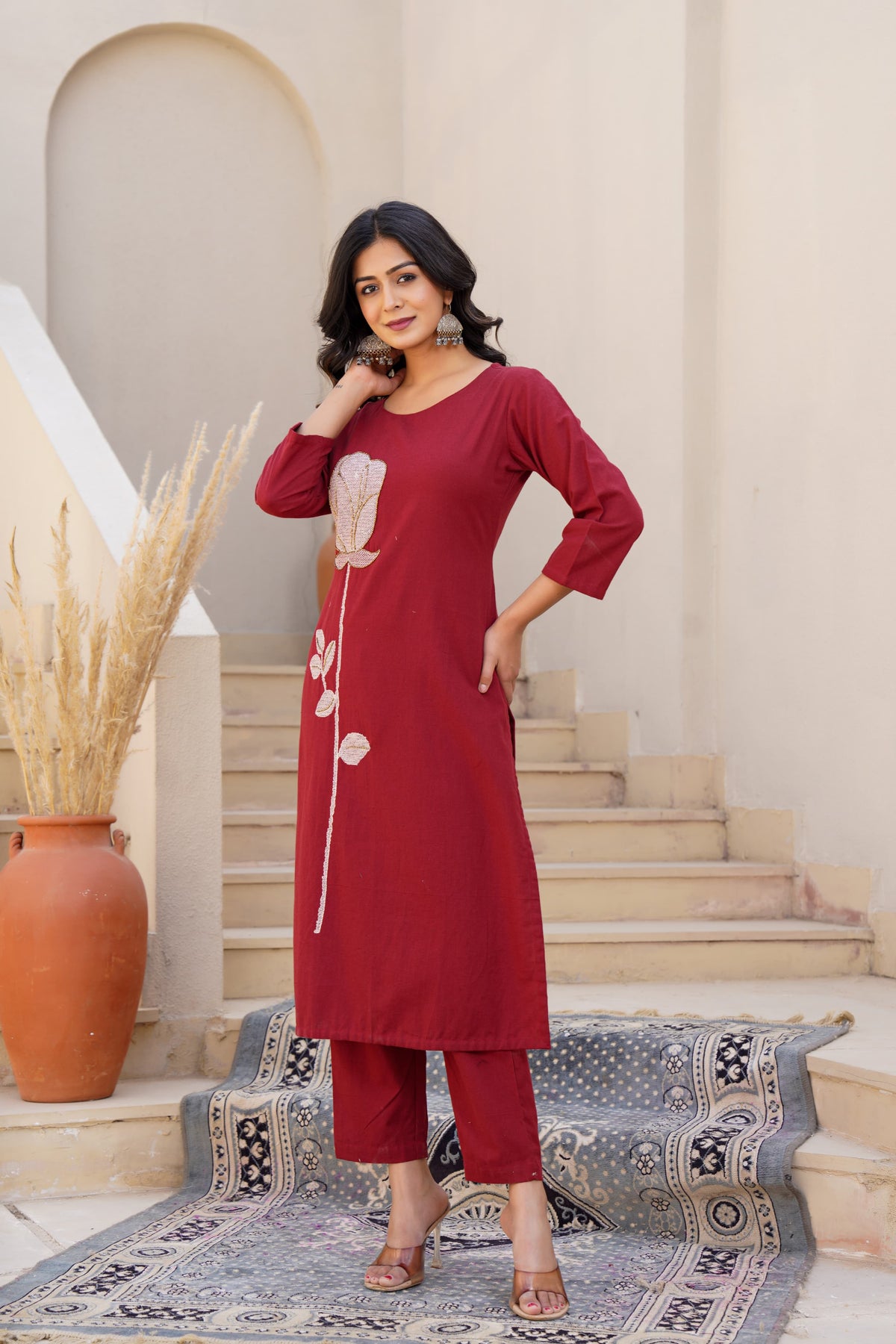 Cotton set with pretty handwork on the kurta in red