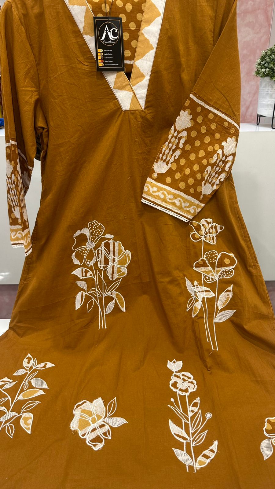 Appliqué work cotton suit with beautiful batik printed pant in mustard