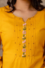 Beautiful embroidered yellow suit set paired with Mul cotton dupatta