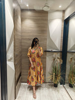 Smart adjustable floral dress in yellow