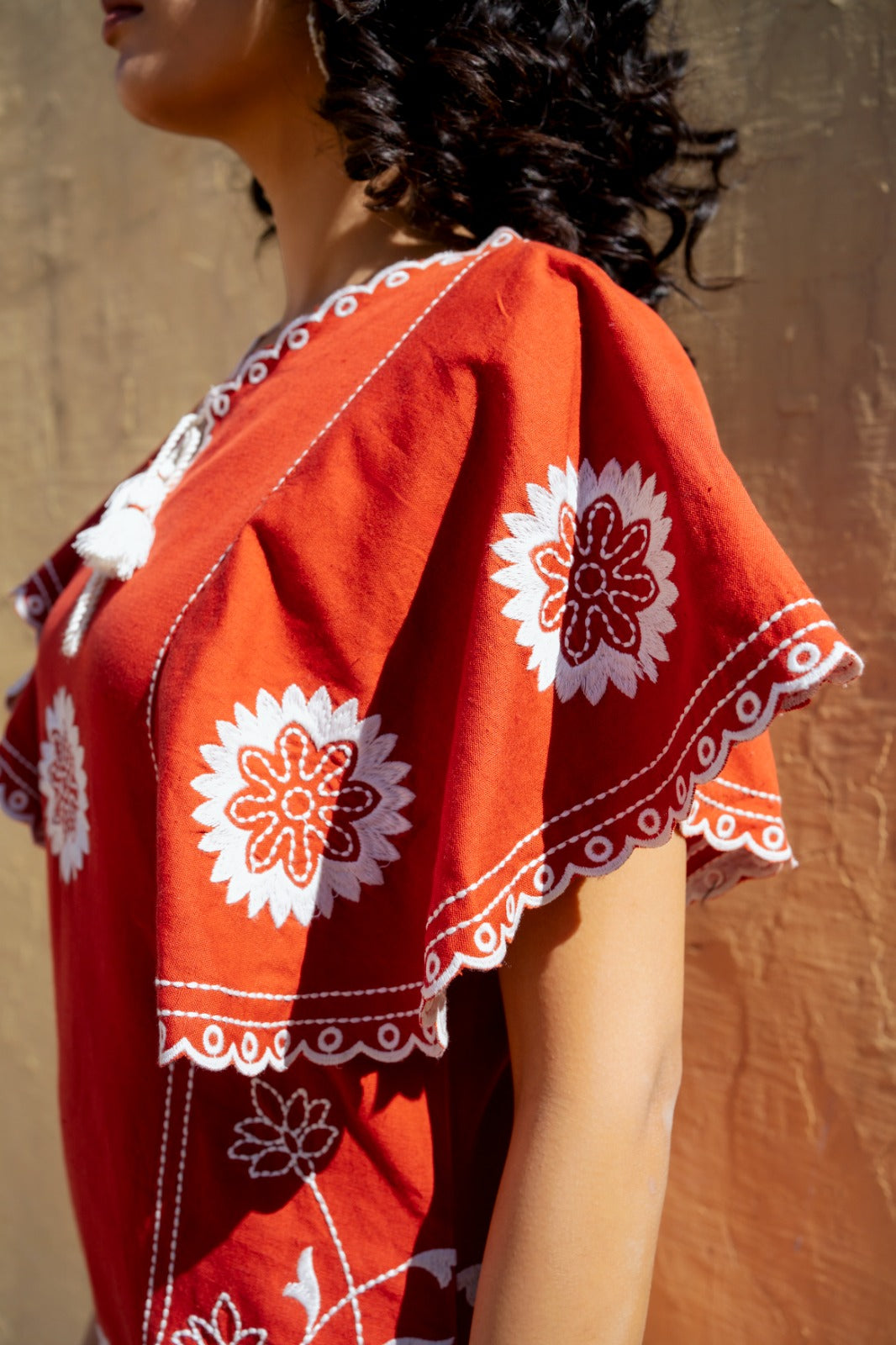 Embroidered cotton vacation dress in rust