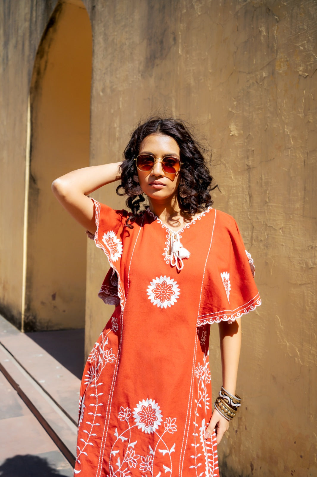 Embroidered cotton vacation dress in rust