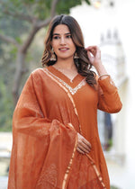 Pretty mul cotton lining suit set paired with Kota Doria dupatta in rust