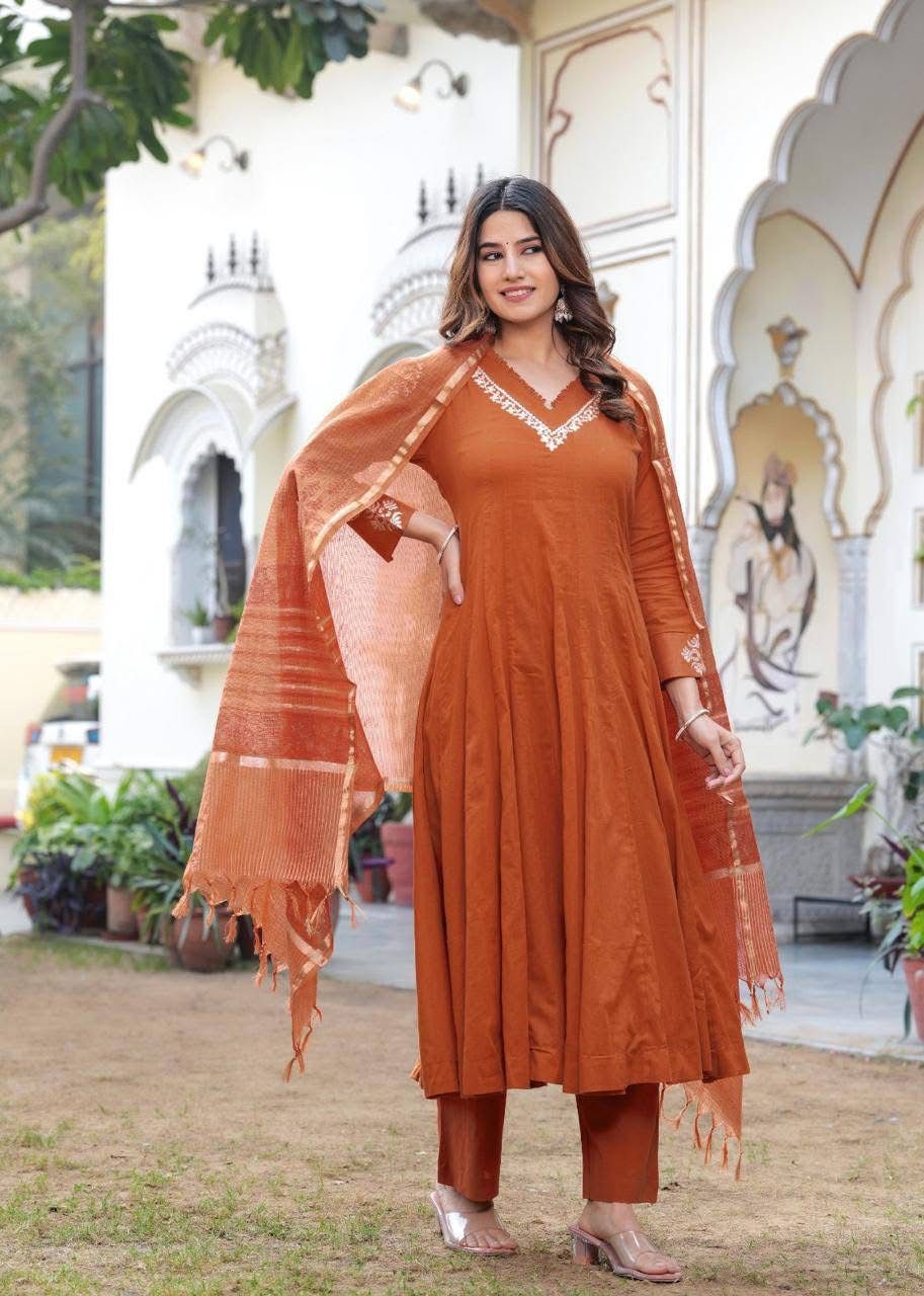 Pretty mul cotton lining suit set paired with Kota Doria dupatta in rust