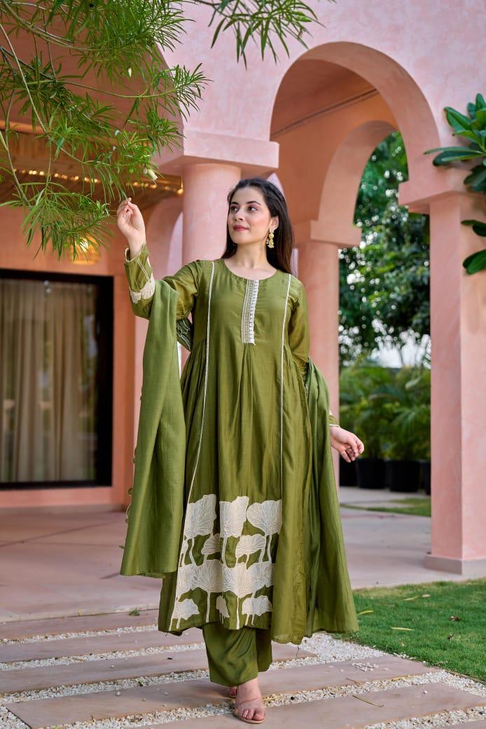 Beautiful appliqué work Mul Chanderi suit in green