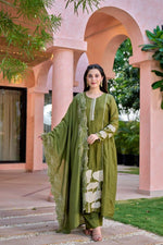Beautiful appliqué work Mul Chanderi suit in green