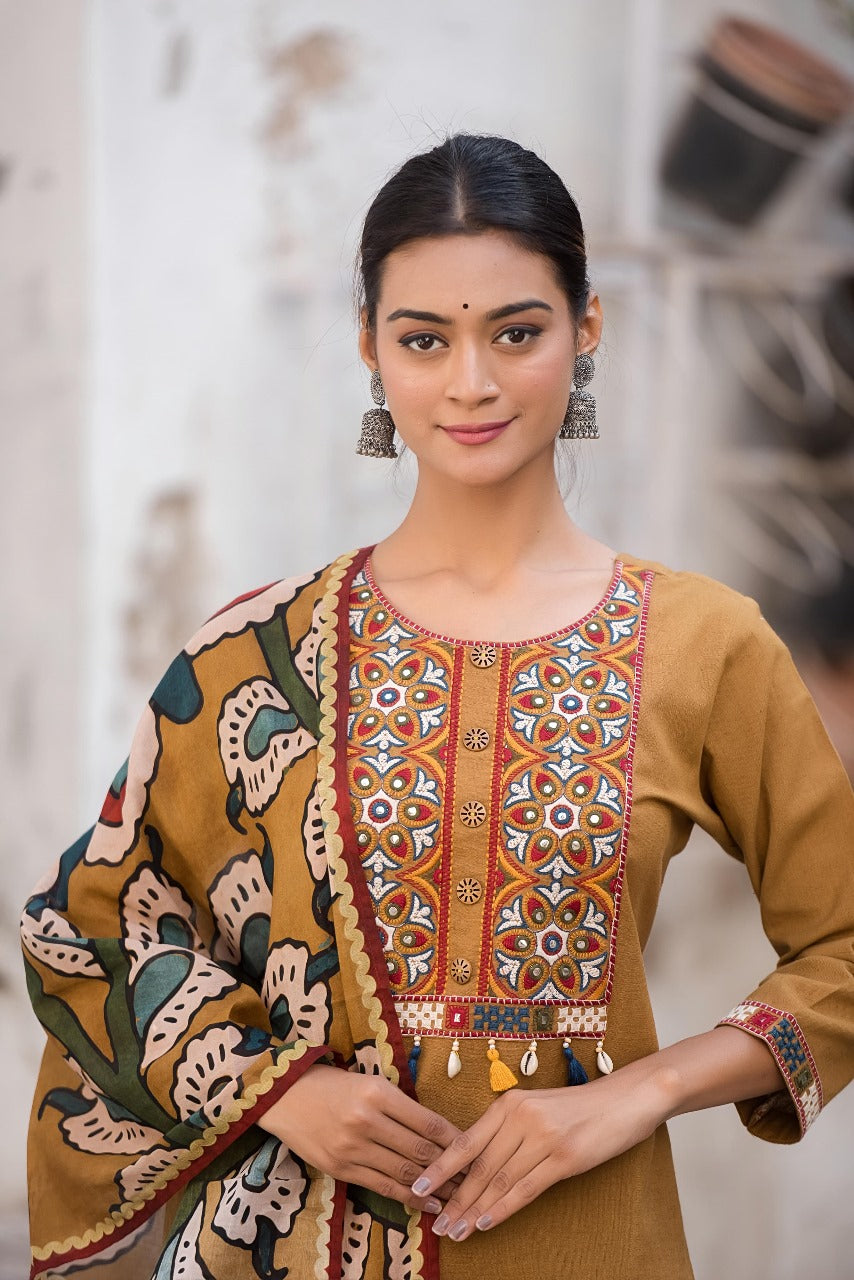 Mustard yellow cotton suit set paired with kalamkari dupatta