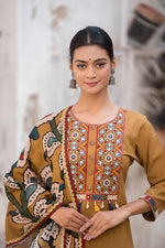 Mustard yellow cotton suit set paired with kalamkari dupatta