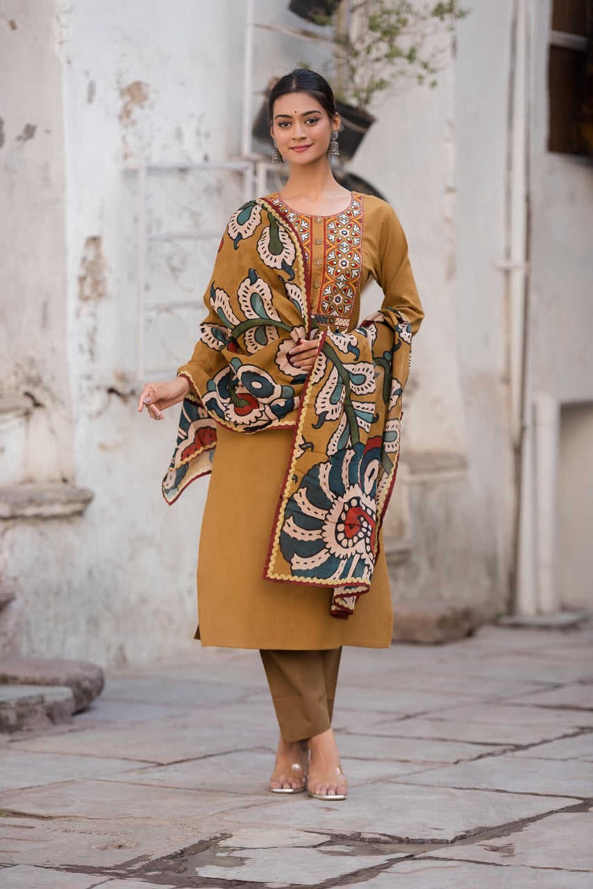 Mustard yellow cotton suit set paired with kalamkari dupatta