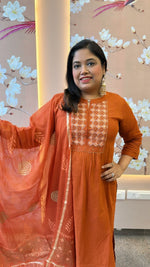 Beautiful rust Pittan dress with gold Zari dupatta
