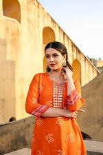 Pure mul silk with beautiful yoke in rust n tan in bandhani