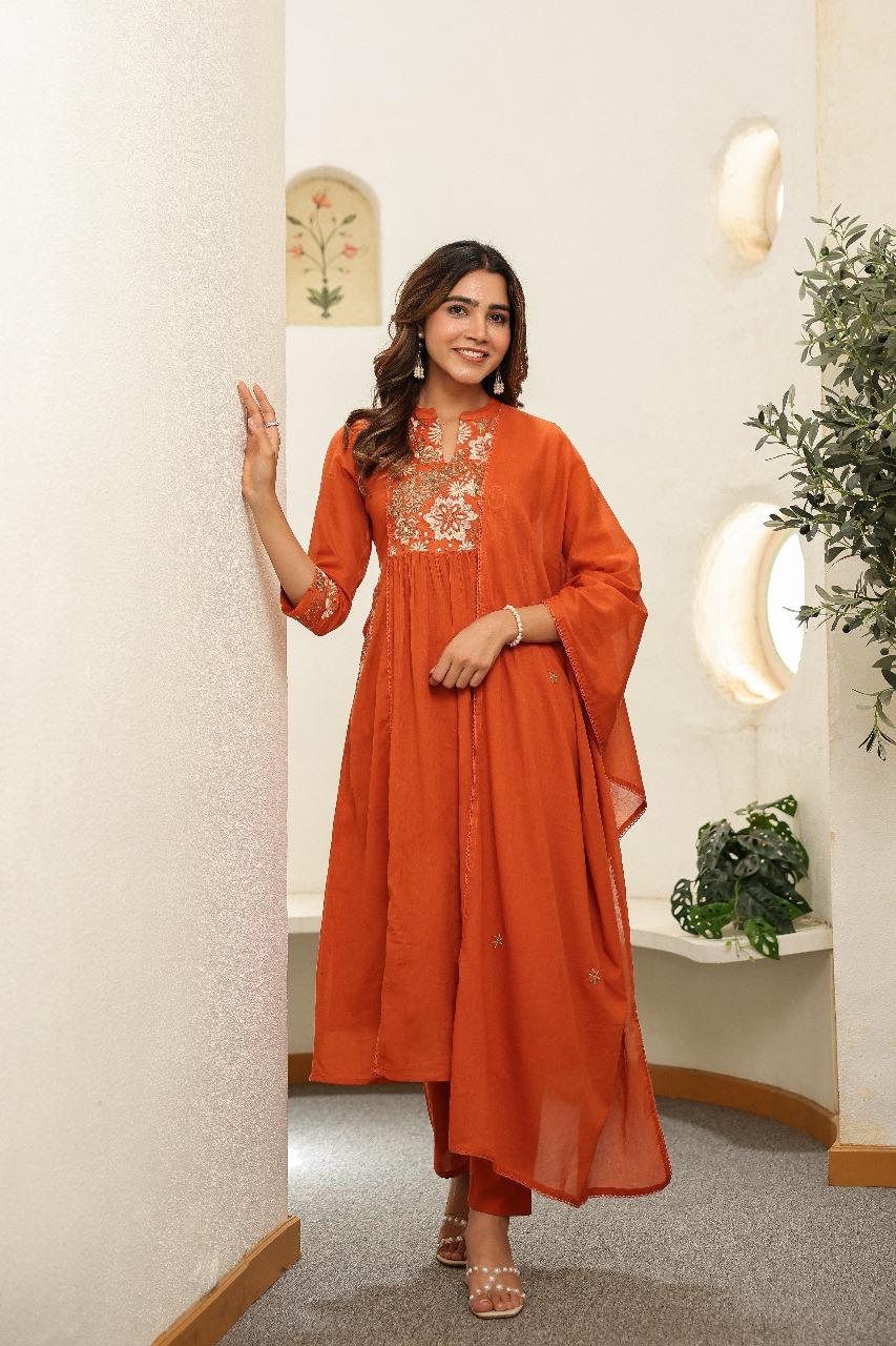 Pure Mul cotton in rust embroidered suit set with designer pocket