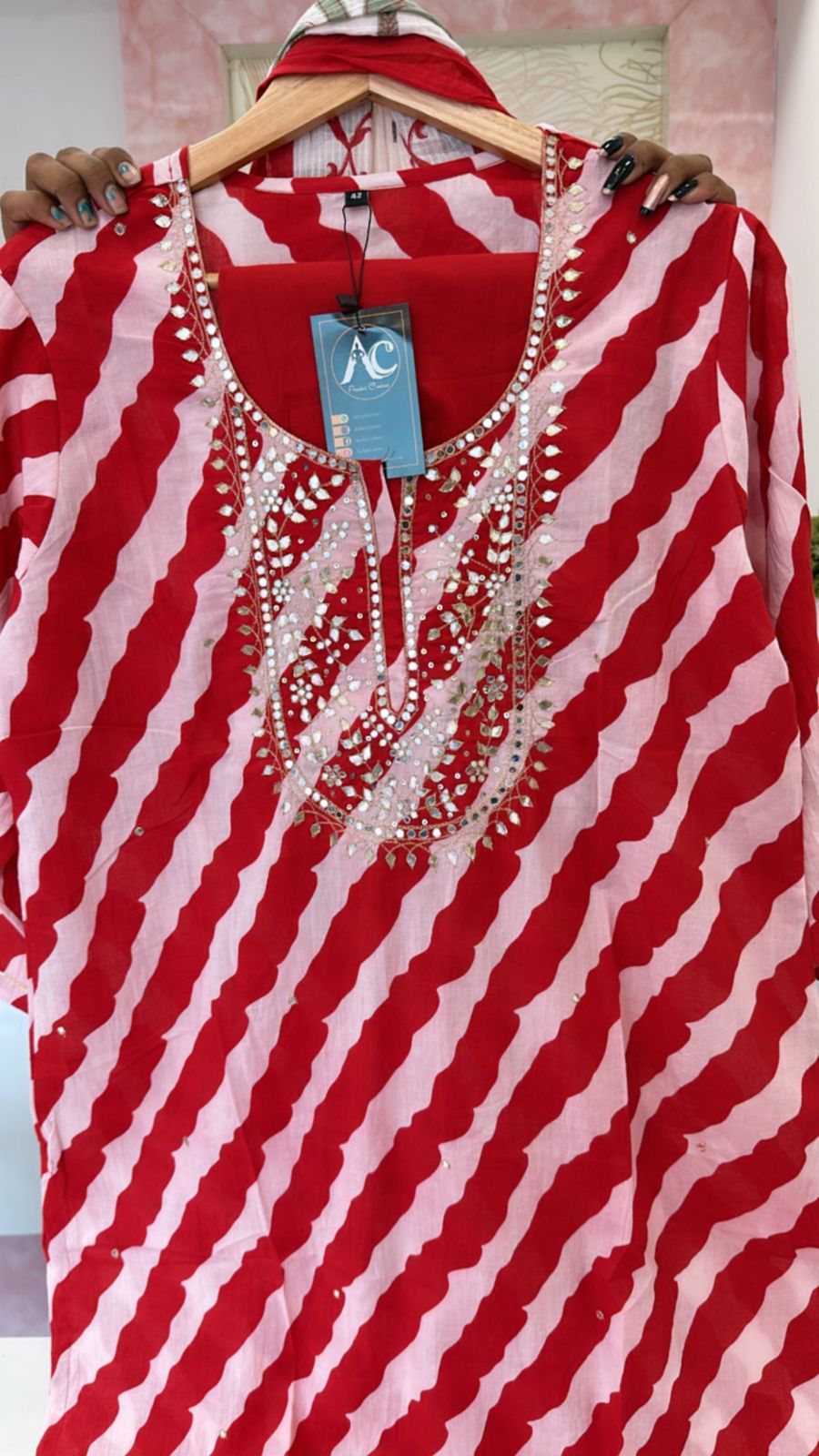 Pretty pretty Lehariya cotton suit set in red paired with floral dupatta