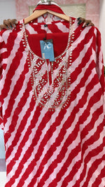 Pretty pretty Lehariya cotton suit set in red paired with floral dupatta