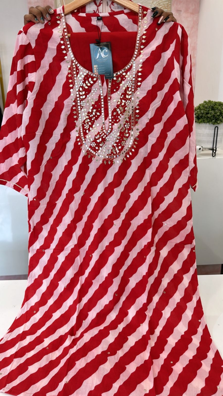 Pretty pretty Lehariya cotton suit set in red paired with floral dupatta