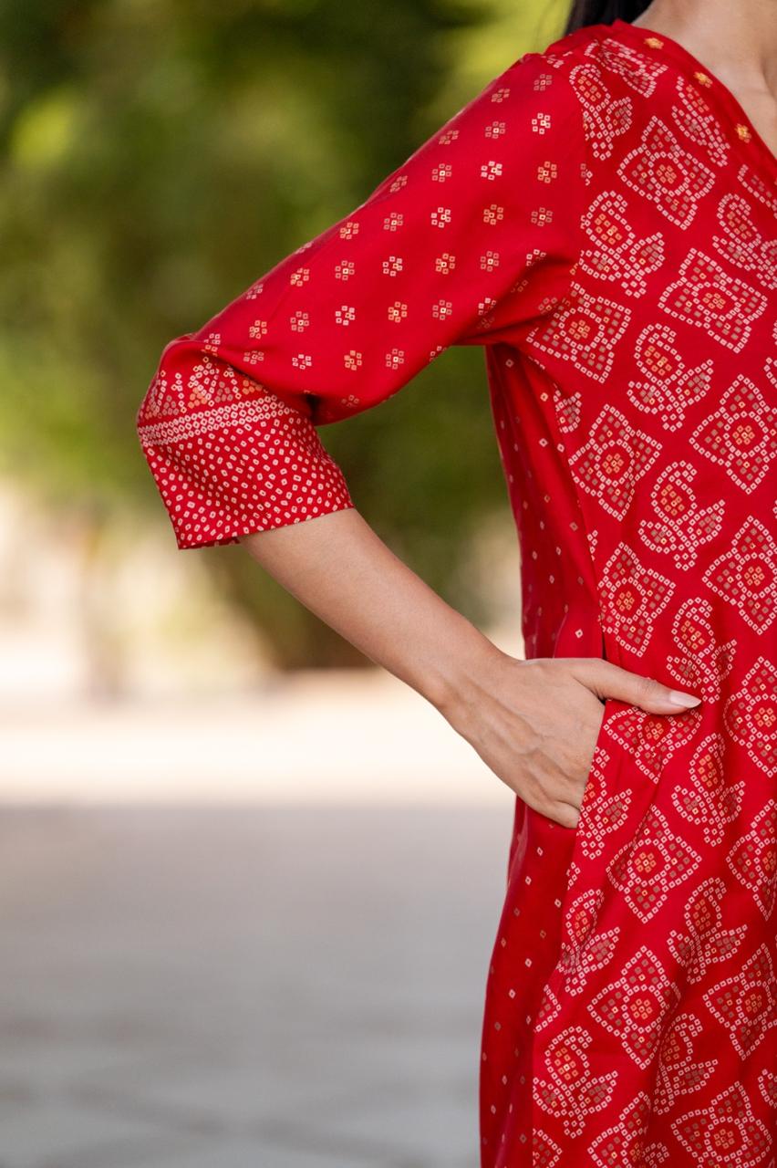 Pretty muslin bandhani suit set in red