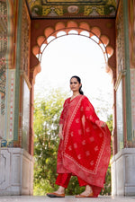 Pretty muslin bandhani suit set in red