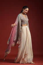 Pretty crepe heavy handwork designer party wear. Blouse, cape n pleated skirt