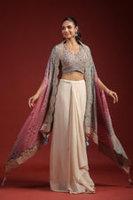 Pretty crepe heavy handwork designer party wear. Blouse, cape n pleated skirt