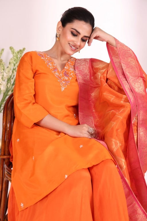 Pure dola silk hand work kurta paired with chinon sharara and Banarasi dupatta