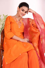 Pure dola silk hand work kurta paired with chinon sharara and Banarasi dupatta