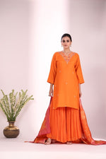 Pure dola silk hand work kurta paired with chinon sharara and Banarasi dupatta