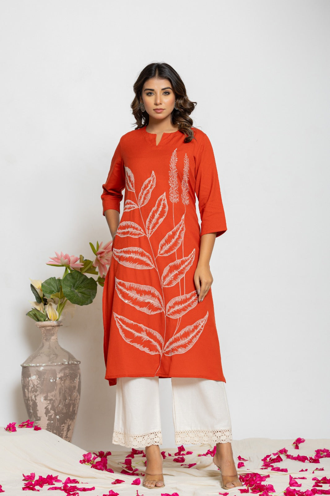 Embroidered kurta paired with lace detailing palazzo pant