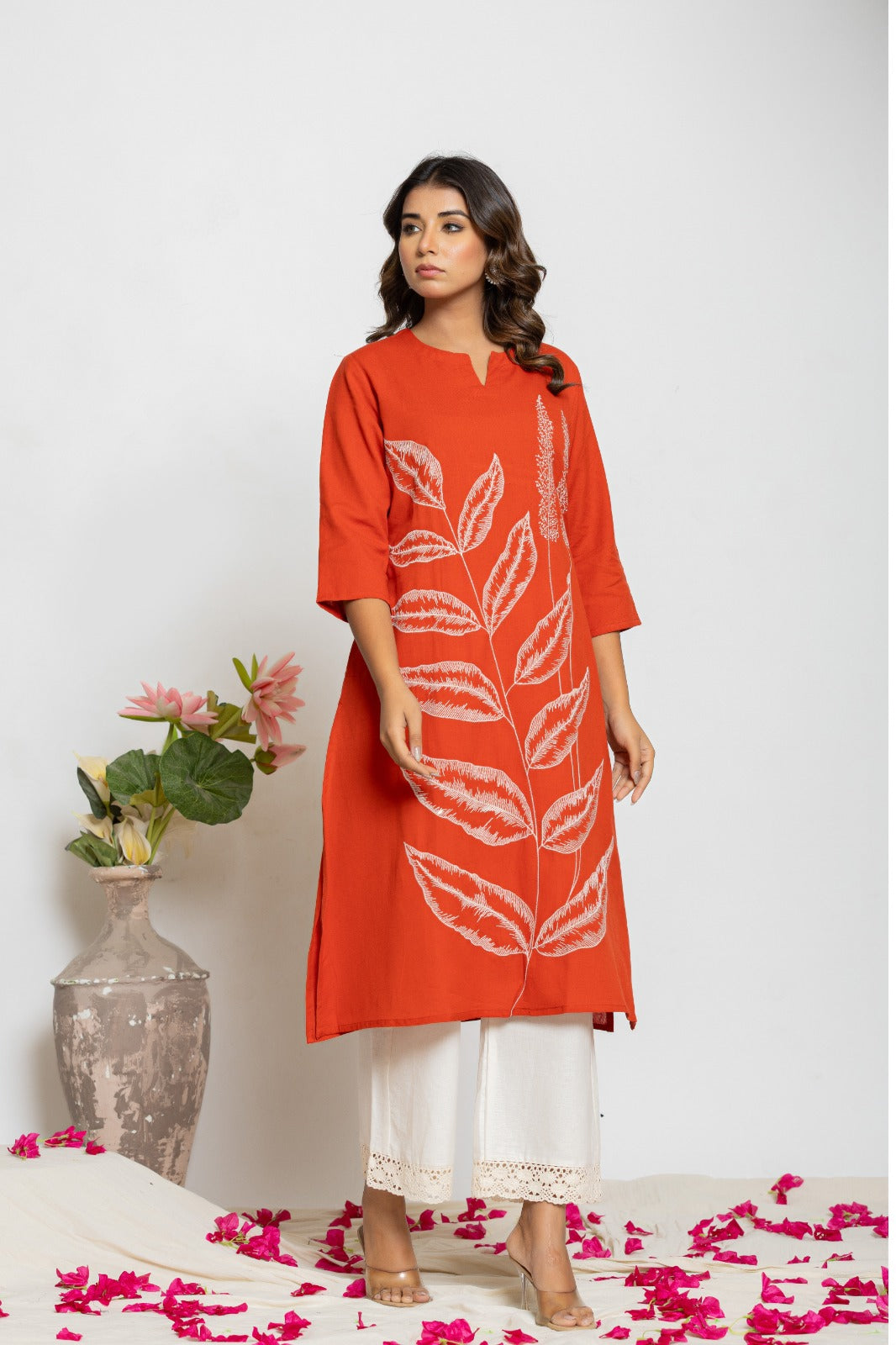 Embroidered kurta paired with lace detailing palazzo pant