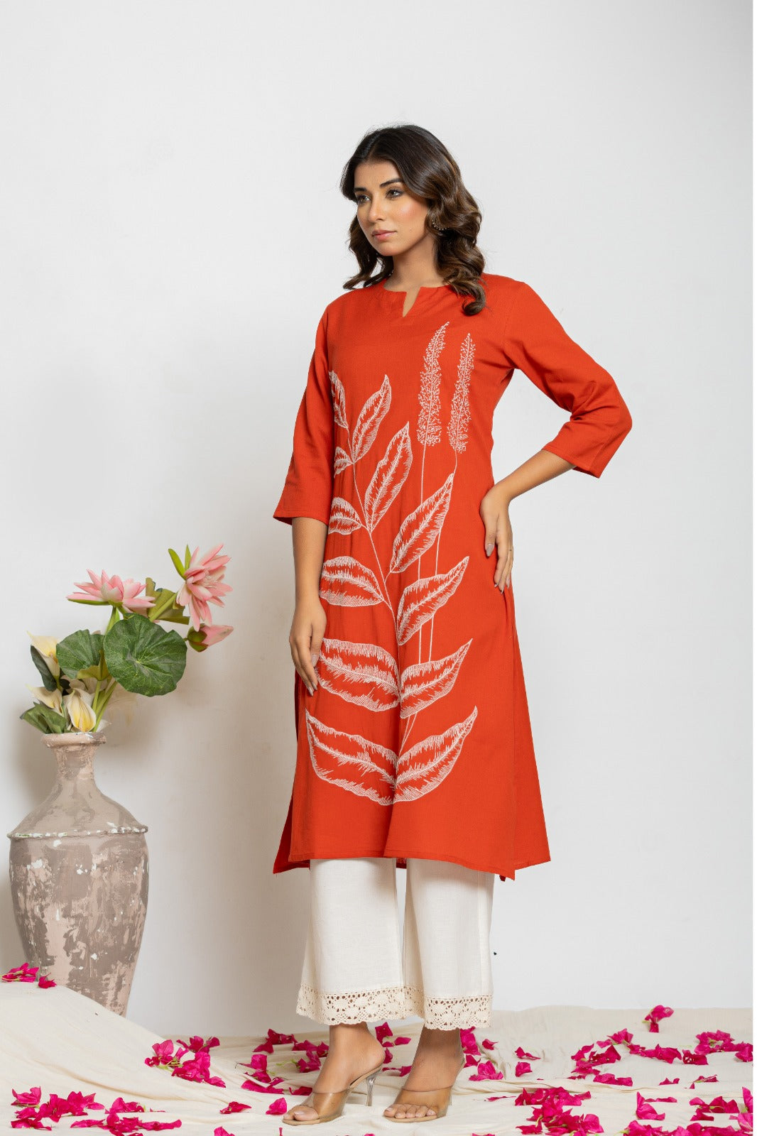 Embroidered kurta paired with lace detailing palazzo pant