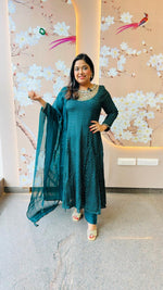 Heavy chinon tissue lining suit paired with heavy shantoon bottom and organza dupatta