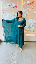 Heavy chinon tissue lining suit paired with heavy shantoon bottom and organza dupatta