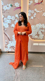 Heavy chinon tissue lining suit paired with heavy shantoon bottom and organza dupatta