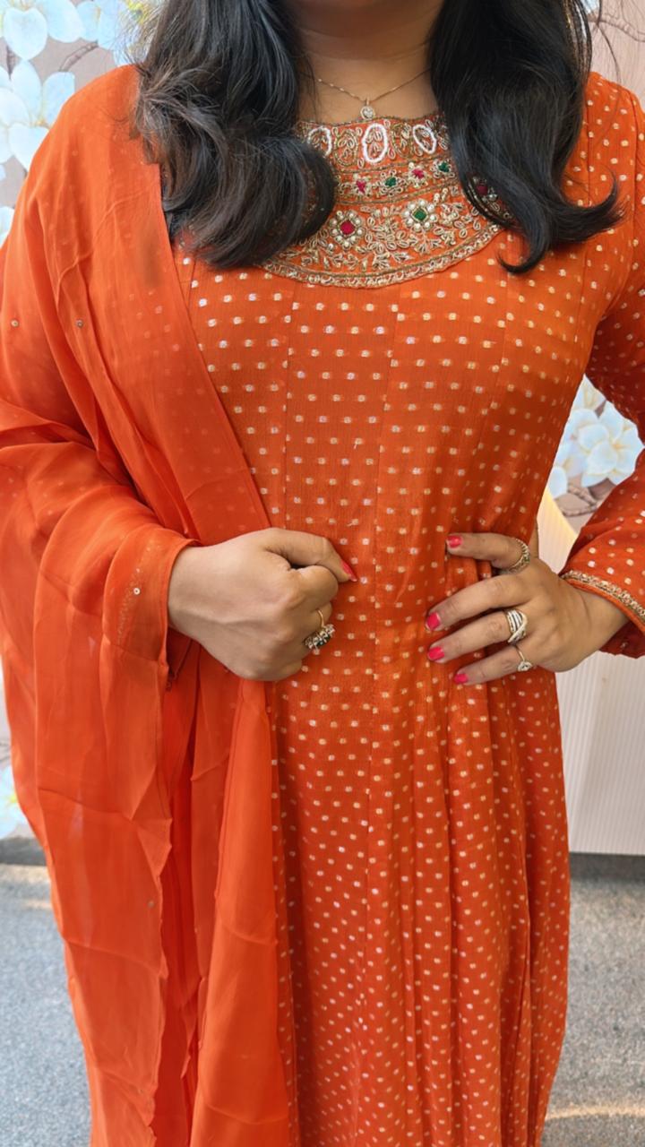 Heavy chinon tissue lining suit paired with heavy shantoon bottom and organza dupatta