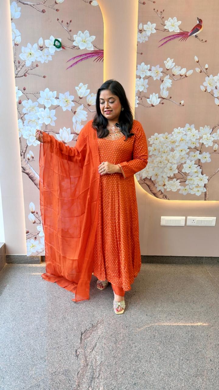 Heavy chinon tissue lining suit paired with heavy shantoon bottom and organza dupatta