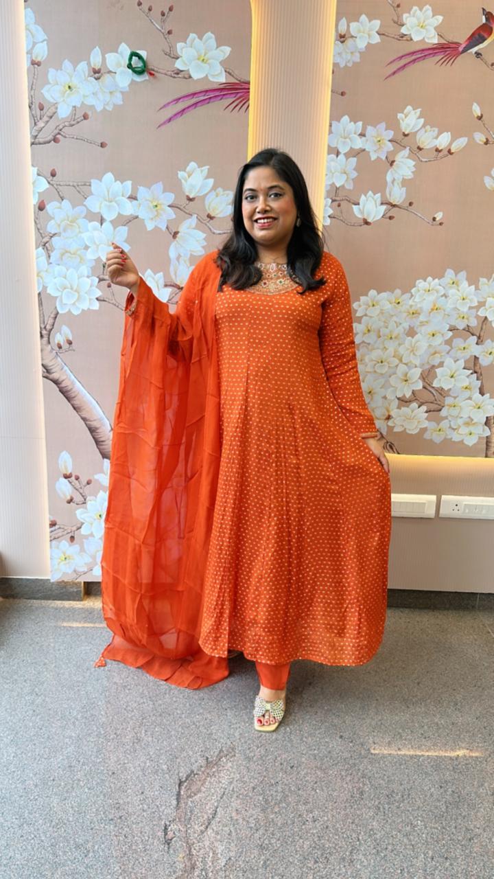 Heavy chinon tissue lining suit paired with heavy shantoon bottom and organza dupatta