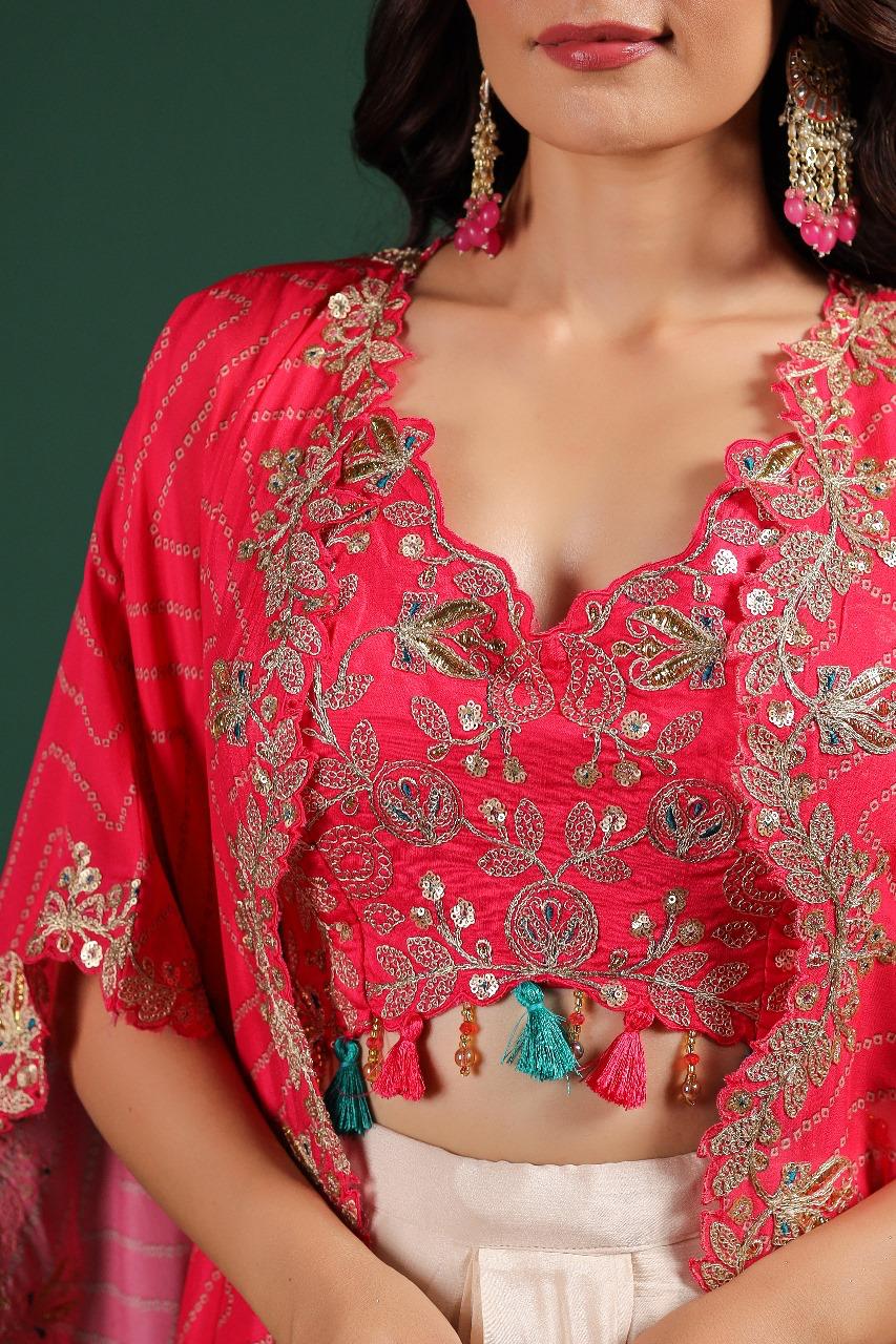 Beautiful chinon pleated skirt paired with embellished blouse and a cape (extra margin available) in pink