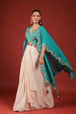 Beautiful chinon pleated skirt paired with embellished blouse and a cape (extra margin available) in blue