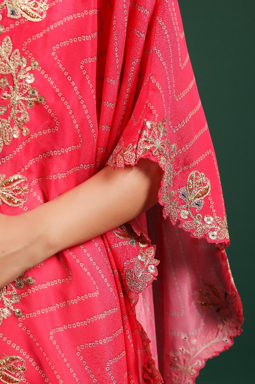 Beautiful chinon pleated skirt paired with embellished blouse and a cape (extra margin available) in pink