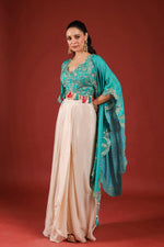 Beautiful chinon pleated skirt paired with embellished blouse and a cape (extra margin available) in blue