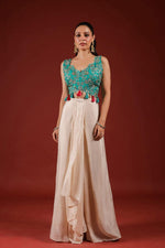 Beautiful chinon pleated skirt paired with embellished blouse and a cape (extra margin available) in blue