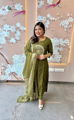 Beautiful green Zari detailing suit set