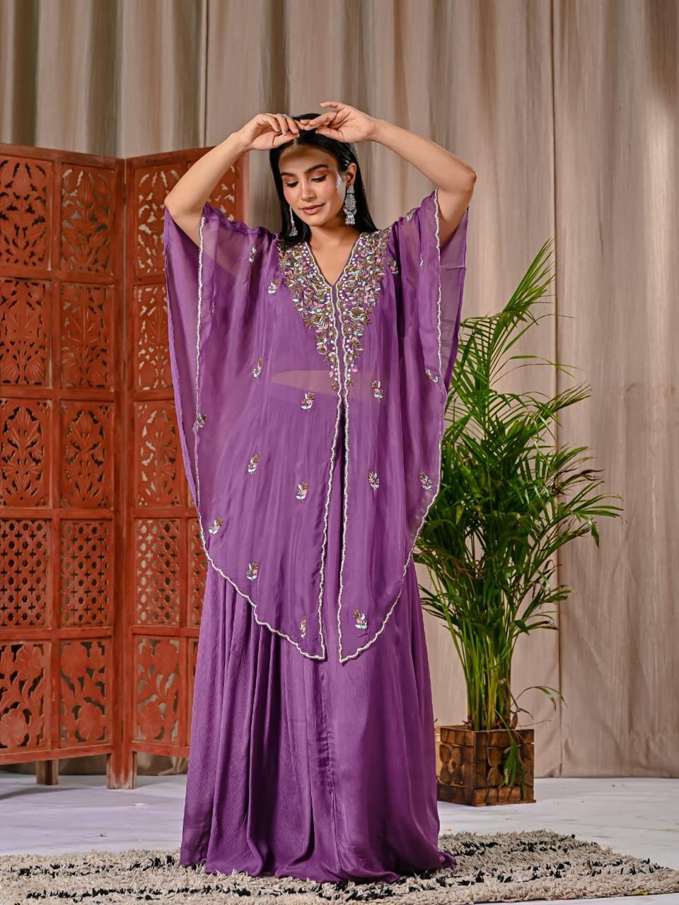 Pretty purple chinon skirt paired with a blouse and a handwork organza jacket