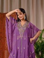 Pretty purple chinon skirt paired with a blouse and a handwork organza jacket